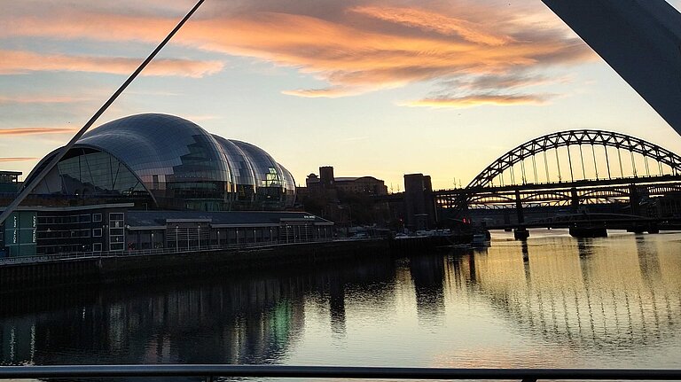 A view looking toward the Glasshouse from the Gateshead Millenium Bridge