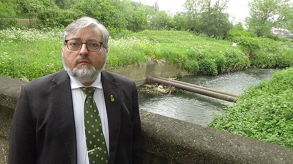 Ron at polluted river Team