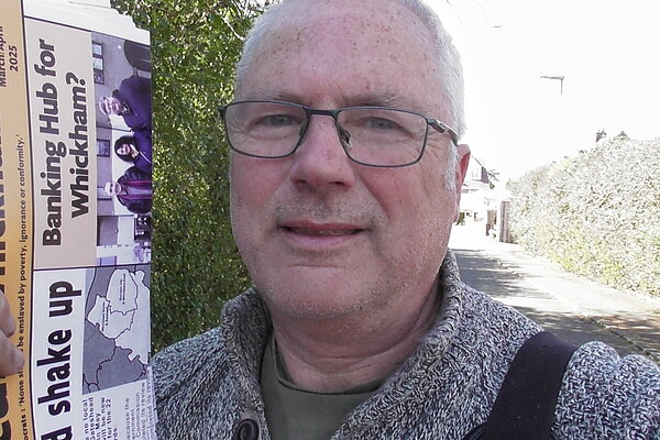 Cllr Wallace delivering leaflets